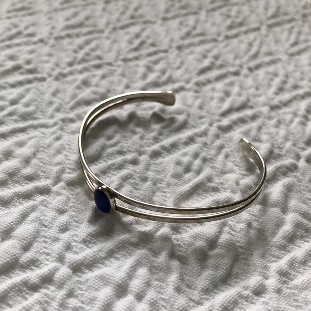 Silver bracelet with blue stone